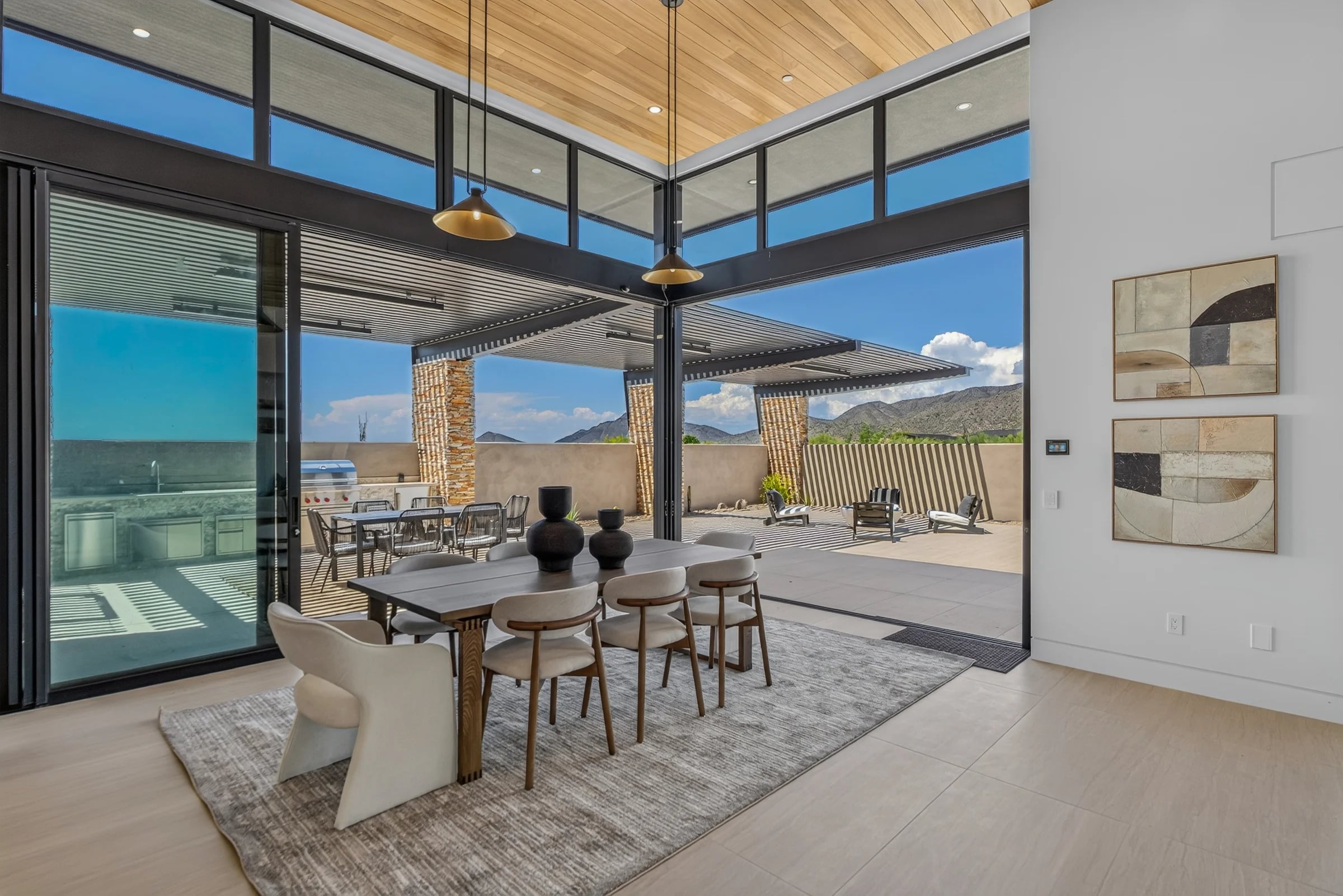 Corner glazing opens the Salero dining room to mountain views.